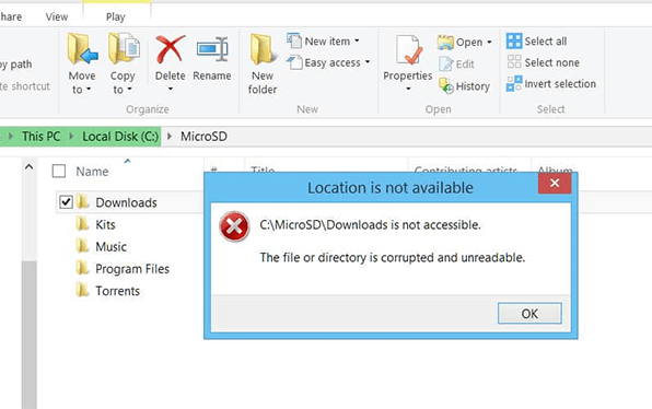 Pictures showing the computer warning the file on the MicroSD card being corrupted or unreadable